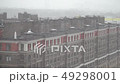 Snowing behind the window. 49298001