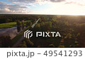 Aerial Flying Above the Lake in the Forest 49541293