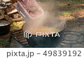 tourist pot on the fire in the summer 49839192