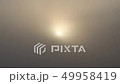 Thick fog in front of the sun 49958419