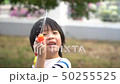 Cute Asian child playing with water gun  50255525