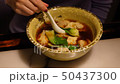 Asian food dampling soup in bowl 50437300
