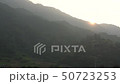Tranquil Rural Village Rising beyond the ridge in the morning 50723253
