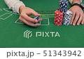 Tricks with Stack of Poker Chips 51343942