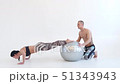 Athletic Woman Doing PushUps 51343943