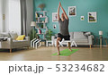 Young man doing yoga in the morning in his living room 53234682