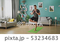 Young man doing yoga in the morning in his living room 53234683