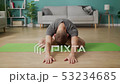 Young man doing yoga in the morning in his living room 53234685