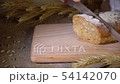 whole grain bread cutting on wooden cutting board 54142070