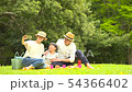 Families enjoying picnics 54366402