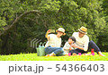 Families enjoying picnics 54366403