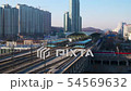 Ktx train passing through the station at high speed 54569632