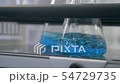 liquid being mixed in laboratory glassware. mixing blue liquid in laboratory glassware. mixing in 54729735