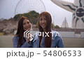 Two Japanese women exploring Bampaku park 54806533