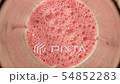 Chopping tomatoes in a blender. View from inside the blender. Close up 54852283