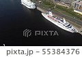 4k aerial view of cruise ships anchored on river Daguava, Riga 55384376