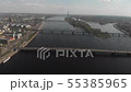 4k aerial skyline view panorama of Daugava river, bridges, cruise ships and city buildings 55385965
