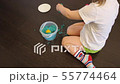 Child playing with kinetic sand at home 55774464