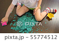 Child playing with kinetic sand at home 55774512