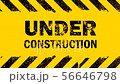 Yellow background with under construction sign 56646798