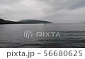 Aerial view of water overlooking a fishing boat. in Faroe Islands, a territory of Denmark in the 56680625