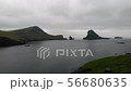 Aerial view of Tindholmur and Drangarnir islands in Faroe Islands, a territory of Denmark in the 56680635