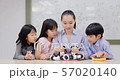 Group of Student and Teacher in robot class. Advisor explain about her robot project to student. Educational Technology Concept. 57020140