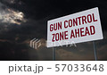 4K Gun Control Zone Ahead Warning Sign under Clouds Timelapse 57033648