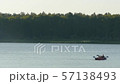people on a kayak swim on the lake and sharply change direction 57138493