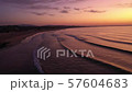 Aerial view of sunrise above Meia Praia beach of Lagos, Algarve, Portugal 57604683
