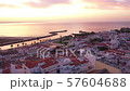 drone view of sunrise above tourist town Lagos, Algarve, Portugal at summer 57604688