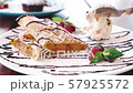Chef cooking apple strudel with raspberry 57925572