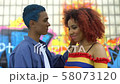 Young male looking with love at red-haired 58073120