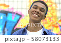 Happy modern college student smiling on camera 58073133