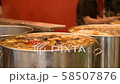 Large cooking pots with boiling Vietnamese soup Pho in a Vietnamese restaurant 58507876