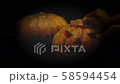 Halloween pumpkin head jack have the hands extended in and placed candles in the pumpkin.halloween and holidays concept.4K UHD video. 58594454