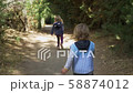 Siblings running on the forest 58874012