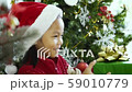 Asian little girl receiving a gift box 59010779