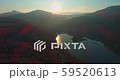 Levee drone aerial flying at sunrise with hills and mountains in Hungary 59520613