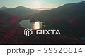 Levee drone aerial flying at sunrise with hills and mountains in Hungary 59520614