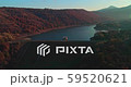 Levee drone aerial flying at sunrise with hills and mountains in Hungary 59520621
