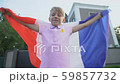Young french football fan with flag cheering team 59857732
