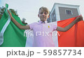 Italian football fan waving national flag 59857734