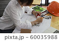Engineer and Architect concept, Engineer Architects office team working with blueprints 60035988
