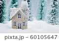 House in winter forest 60105647