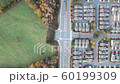 Aerial 4k footage Top to bottom of Atlanta suburbs showing houses and new developments with cars passing by 60199309