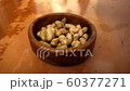 The Peanuts in wooden pot. 60377271