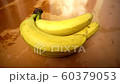 The Flickering yellow banana on a orange background. Stop motion. 60379053