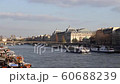 Boats traffic on Seine river with Orsay Museum and Passerelle Leopold Sedar Senghor in background - Paris, France 60688239