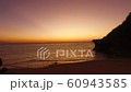Sunset over the beach 60943585